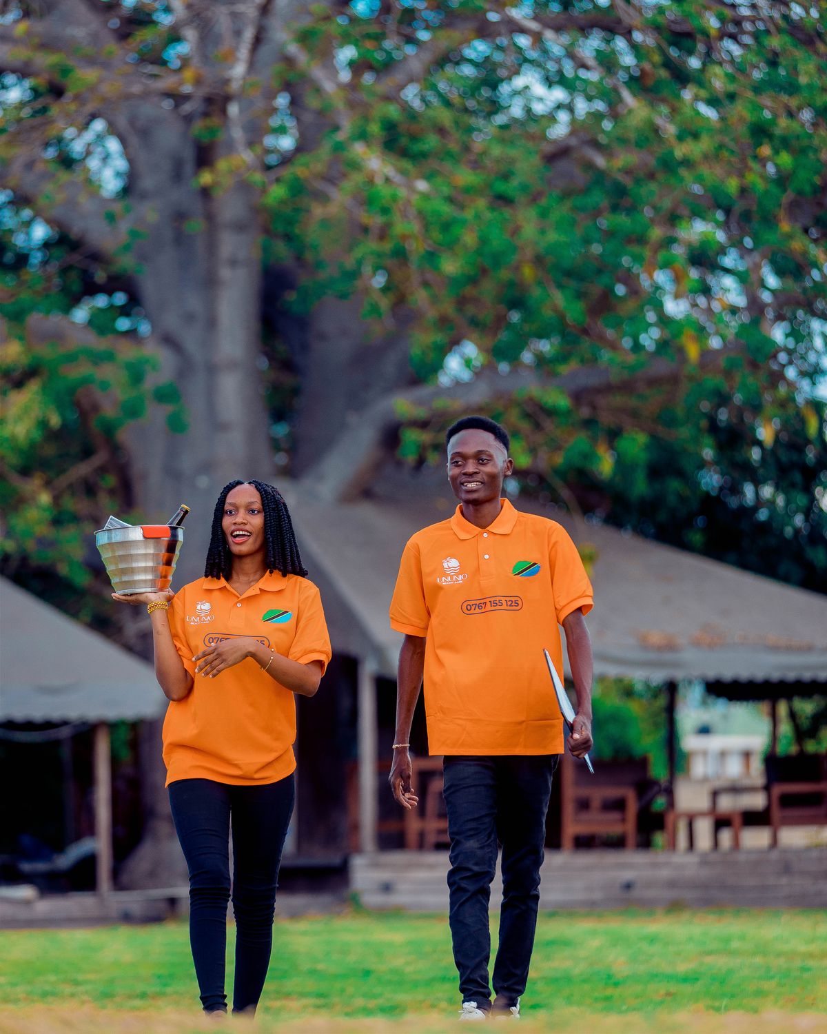 Ununio Beach Park hosts crossing the event lawn with an ice bucket
